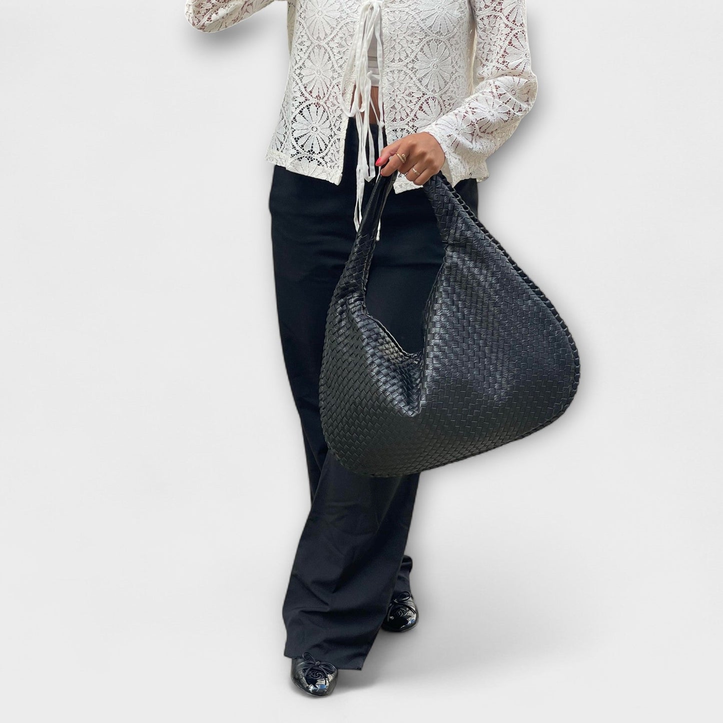 Cristina – Bolso de mano trenzado y moderno